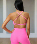 Rear crisscross strap detail on pink cami