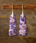 Handcrafted purple stone earrings with an elegant gold-plated hook and smooth polished finish.