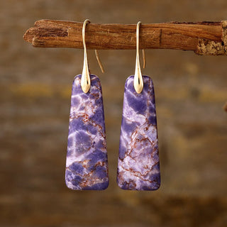 Handcrafted purple stone earrings with an elegant gold-plated hook and smooth polished finish.