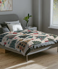 Blanket styled on bed with retro Christmas print