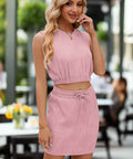 Ribbed pink two-piece set with high waist skirt and sleeveless top