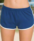 Back view of sporty royal blue shorts with curved hem