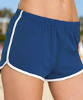 Close-up of royal blue athletic shorts with white contrast trim