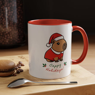 Close-up of Santa capybara ceramic mug with red interior