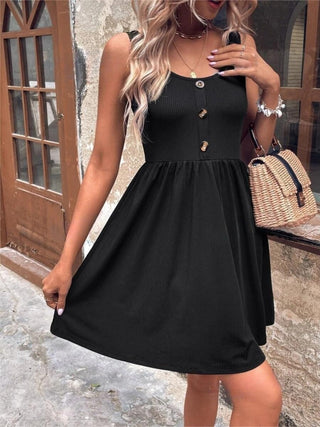 Black tank mini dress with scoop neckline and pleated skirt