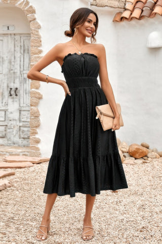 Black strapless smocked midi dress styled for summer outing