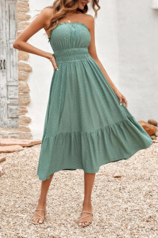 Sage green strapless midi dress flowing with movement