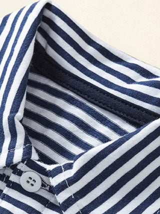 close up of boys striped cotton polo shirt collar and button placket