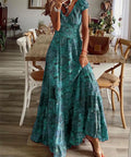 teal floral boho maxi dress styled for vacation and resort wear
