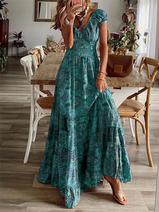 teal floral boho maxi dress styled for vacation and resort wear
