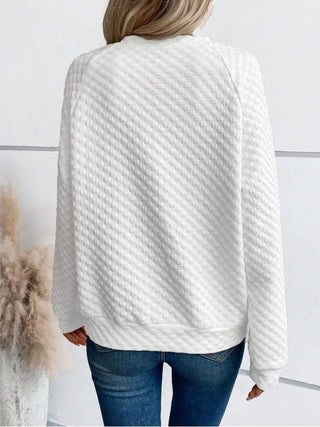 Back view of a white textured raglan sleeve sweatshirt with waffle-style texture