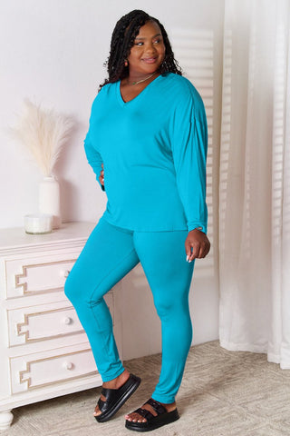 Side view of the blue lounge set, highlighting the smooth, lightweight fabric and relaxed fit.