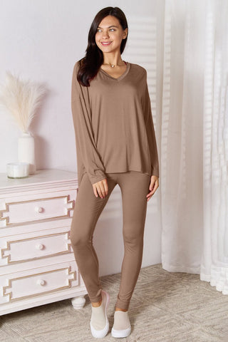 Neutral-toned brown V-neck lounge set, styled with white sneakers for an effortless look.