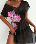 sheer black printed mini dress styled for beach vacation and summer outings
