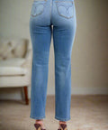 Back view of classic fit denim jeans with straight leg cut