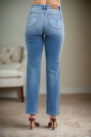 Back view of classic fit denim jeans with straight leg cut