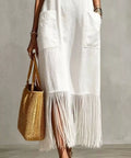 white v neck maxi dress with fringe hem and side pockets
