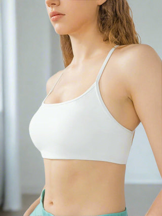 Side profile of woman wearing white top