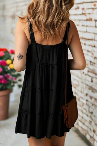 Back of flowy sleeveless mini sun dress with wide straps
