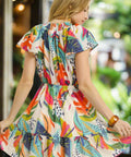 Back view of women’s colorful drawstring waist mini dress, lightweight and flowy for warm days