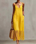 woman wearing yellow fringe hem maxi dress for summer vacation outfit