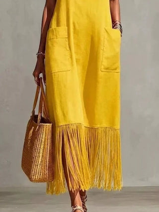 yellow spaghetti strap maxi dress featuring fringe hem detail and pockets